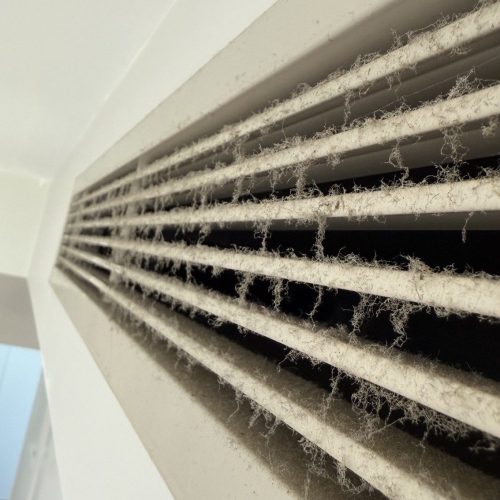 Kitchen air vent before professional cleaning Sydney — CCS Property Maintenance